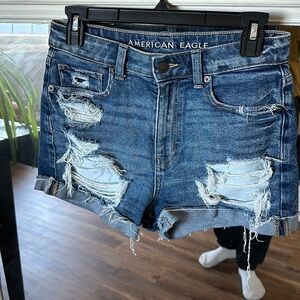 Ladies, American Eagle stretch ripped jean shorts with cuffs. Size 4.